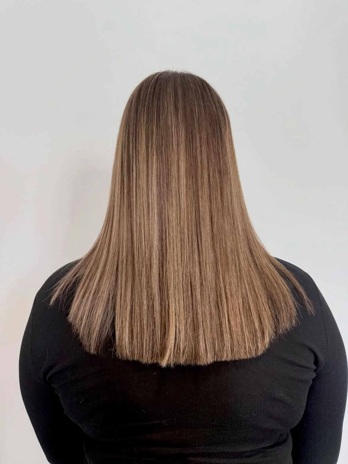 Lissage brillance sur cheveux longs réalisé chez LM Coiffure à Audenge
